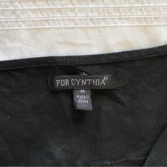 Elegant Black Sleeveless Dress - Picture 6 of 8